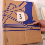 Some of Coetzee's manuscript drafts for "Life & Times of Michael K" are constructed from stacks of exam books bound between a piece of cardboard and held together with wire. The book, published in 1983, went on to win the Man Booker Prize for Fiction. Photo by Alicia Dietrich.