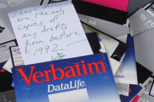 A selection of discs from Denis Johnson's collection. Johnson’s handwritten note states, 'these discs are the only copies of any drafts from before 1992.' Photo by Anthony Maddaloni. Image courtesy of Harry Ransom Center.