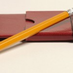 Leather case for Charlotte Brontë's manuscript of "Something About Arthur." The size of the manuscript papers is 5.7 cm by 9.5 cm (2.5 inches by 3 5/8 inches). Photo by Anthony Maddaloni.