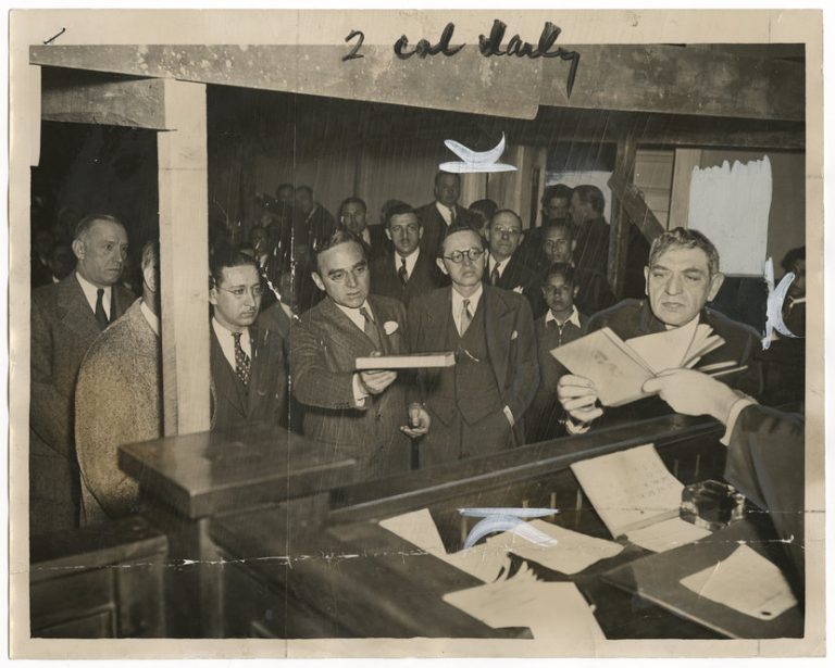Morris L. Ernst (left, holding book) was one of the most active attorneys for the anti-censorship cause during the interwar years. In this 1935 photograph, from the "New York Journal American" collection, Ernst defends the Gustavo Flaubert's "November."