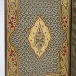 Inside front cover of “The Sensitive Plant” is embellished with multicolored leather onlays, inlays, and gold tooling. Photo by Pete Smith.