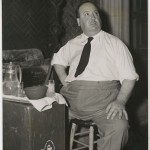 "A 'take' with Tea" publicity still of Hitchcock making his tea on the set of “Rebecca.”