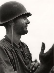 David Douglas Duncan. “Corporal machine-gunner Leonard Hayworth upon learning there were no more grenades, ammunition from his machine-gun reinforcements to take the place of the wounded and dead or communication from the rear, Korea,” September 1950. Gelatin silver print.