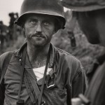 David Douglas Duncan. “Captain Ike Fenton, Commanding Officer of Baker Company, 1st Battalion, 5th Marine Regiment, 1st Provisional Marine Brigade, receives reports of dwindling supplies during the battle to secure No-Name Ridge along the Naktong River, Korea,” September 1950. Gelatin silver print.