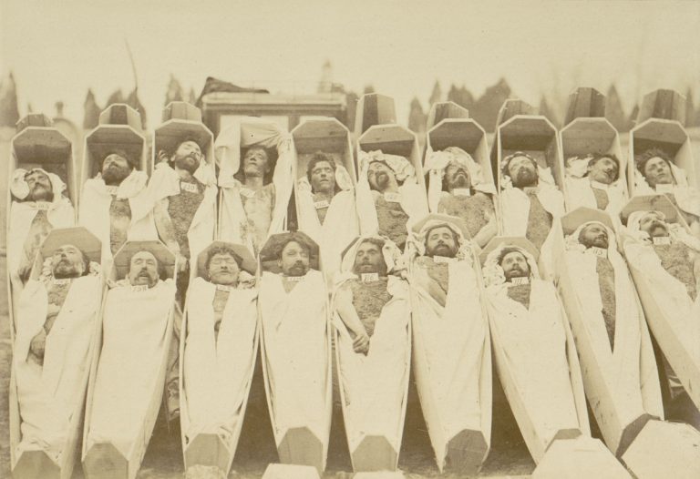 Unknown photographer. “Insurgents in Coffins, Paris,” 1871. Albumen print.
