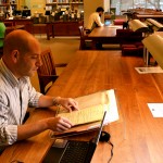 Alex Feldman in the Ransom Center's reading room. Photo by Alicia Dietrich.