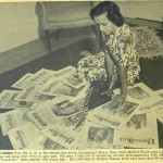 Mildred Blount with her collection of "Harper's Bazaar" magazines, from “Mildred Blount Fashions Bonnets to Fit the Face," "Ebony," (April 1946), 20-22.