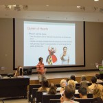 Students present their posters to judges and their classmates. Photo by Pete Smith.