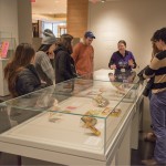 Students in "Advertising and Popular Culture" class receive tour of "Alice's Adventures in Wonderland." Photo by Pete Smith.