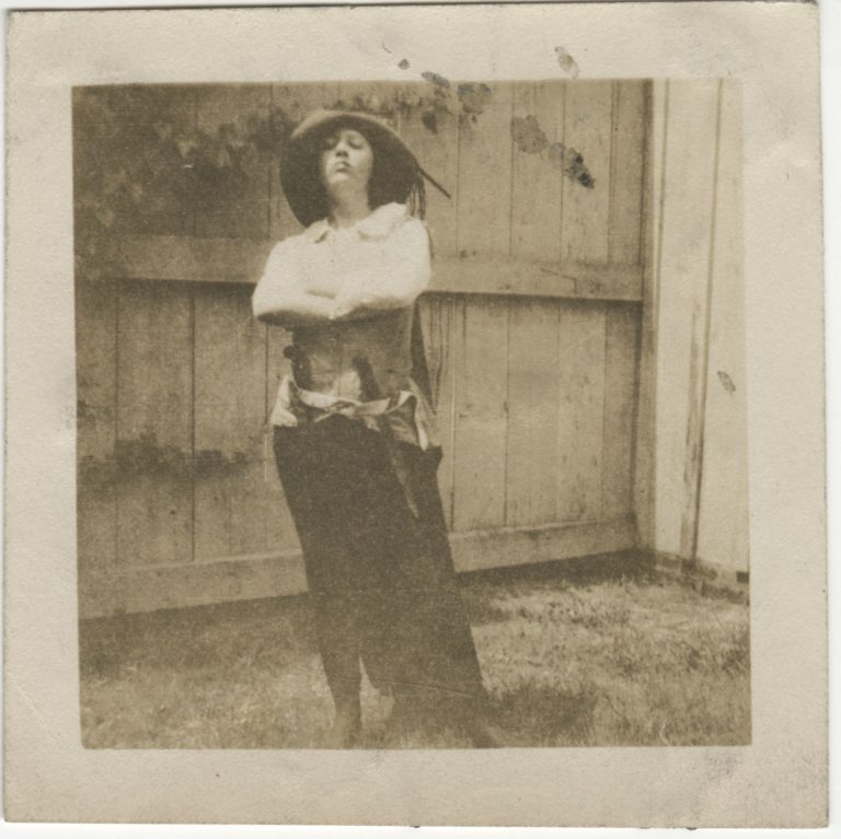 Scott aged 16, perhaps dressed as a French musketeer to please her mother, who, Scott said, "stoutly maintained the Huguenot tradition in our family." Nevertheless, Scott frequently played the man in dressing-up games with her cousins.