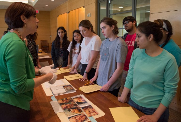 Andi Gustavson, Instructional Services Coordinator at the Ransom Center, shares insight about collection materials. Photo by Pete Smith.