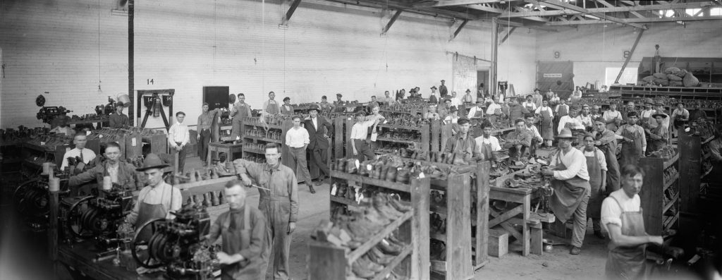 Attributed to C. A. Stead (American, 1870-1932), QMC Shoe Shop, 1910–1940. Digital positive from nitrate negative, 20 x 50.5 cm. E. O. Goldbeck Papers and Photography Collection, 967:0068:0884