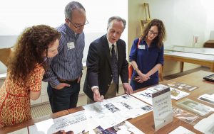 Curator of Film Steve Wilson shares recent acquisitions at the New Member Open House. Photo by Brian Diggs.