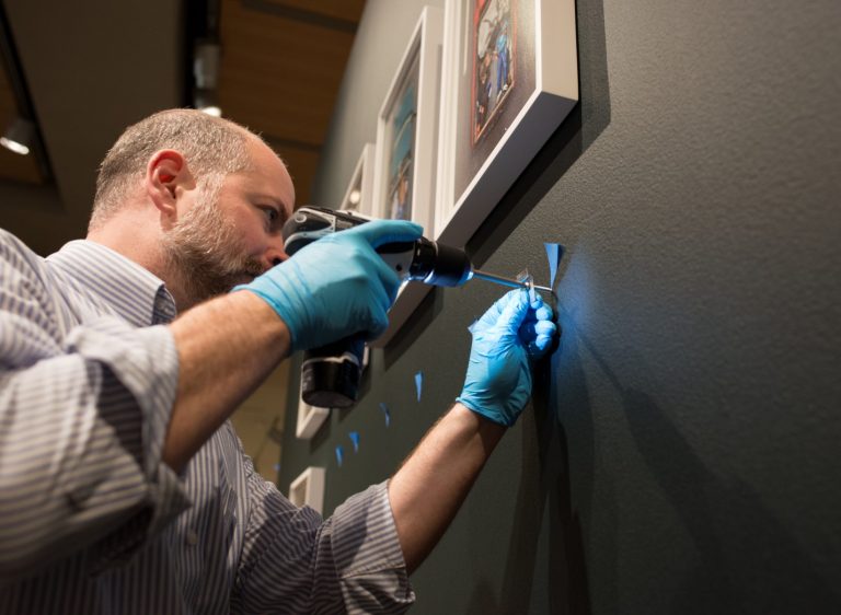 Rob during installation of the spring 2016 exhibition Look Inside: New Photography Acquistions.