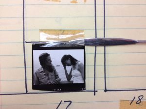 Partially detached yellowed PST.