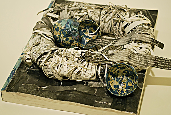 Another deformance of Henderson’s Galerie de Difformité, nested as birds’ eggs by Kat O’Hara and exhibited in Kenyon College’s Greenslade Special Collections & Archives.