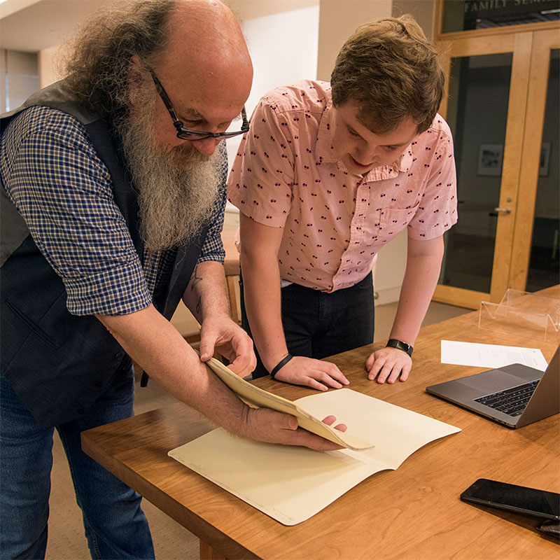 Michael Gilmore assisting a researcher