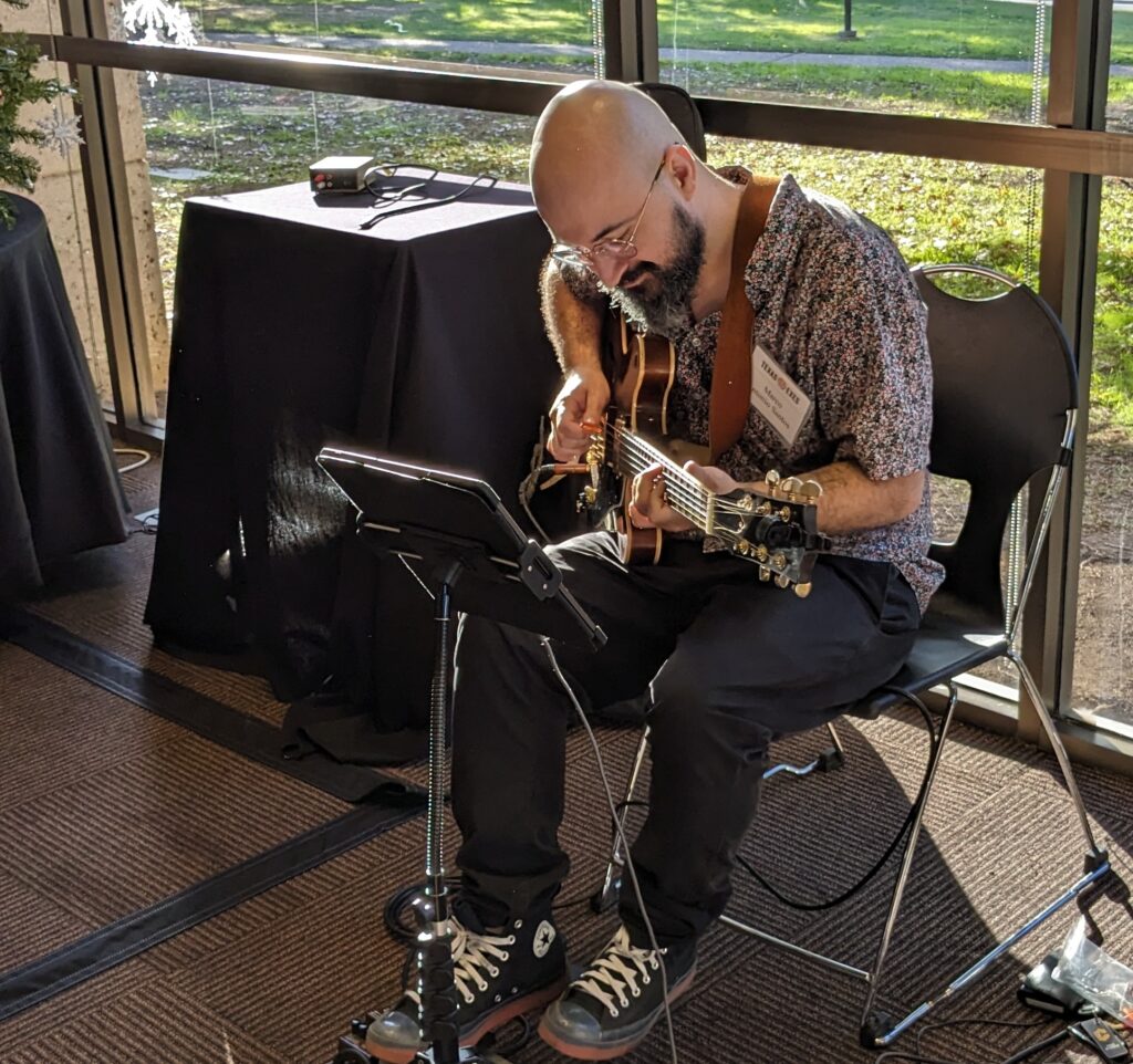 2023 Holiday Party - Featured local guitarist Marco Antonio Santos