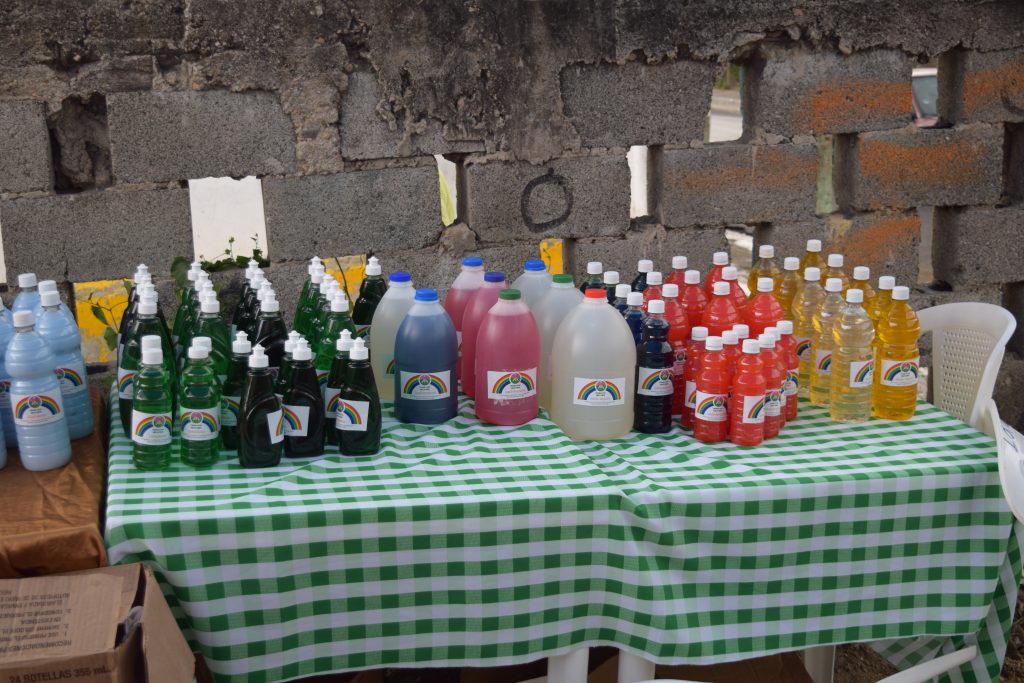 A temporary display of Mujeres Unidas manufactured cleaning products on their first day of being offered to the public. 
