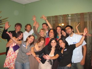 Students from the 2010 practicum course pose for a photo at a fundraiser held in Austin, TX to support a capacity building course for the newly formed community organization FUMPLA. 