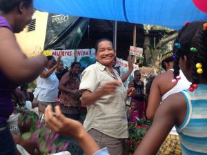 Members of Mujeres Unidas and the large Los Platanitos gather to celebrate Mother's Day and the awarding of certificates. 