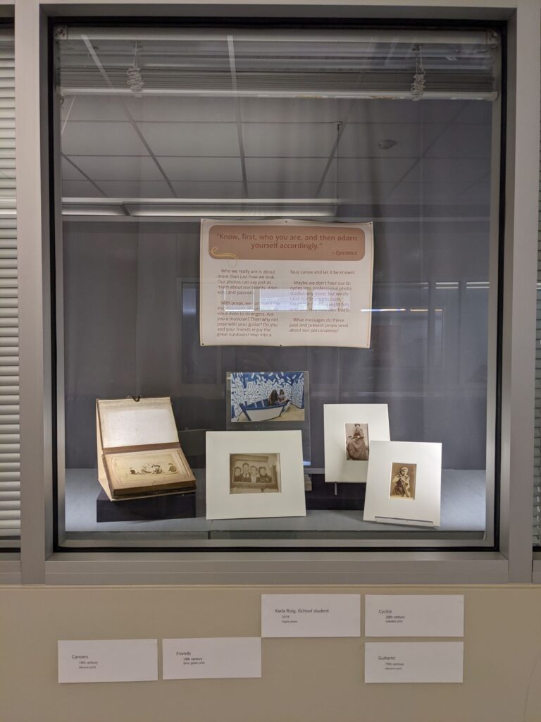 Exhibit window with photographs.