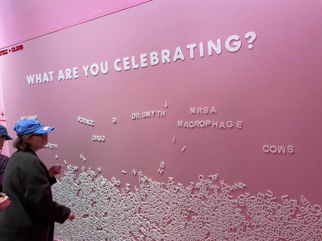 Lab social event at ice cream museum where lab members spell words with moveable letters.