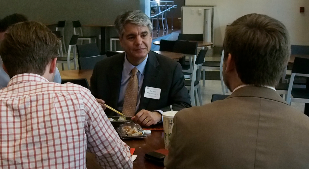 President Greg Fenves having lunch with students in the SAC on his first day in office