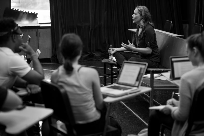 Woman teaching acting class