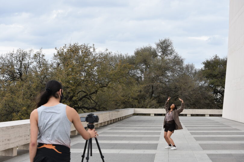 filming dancer with camera on stand