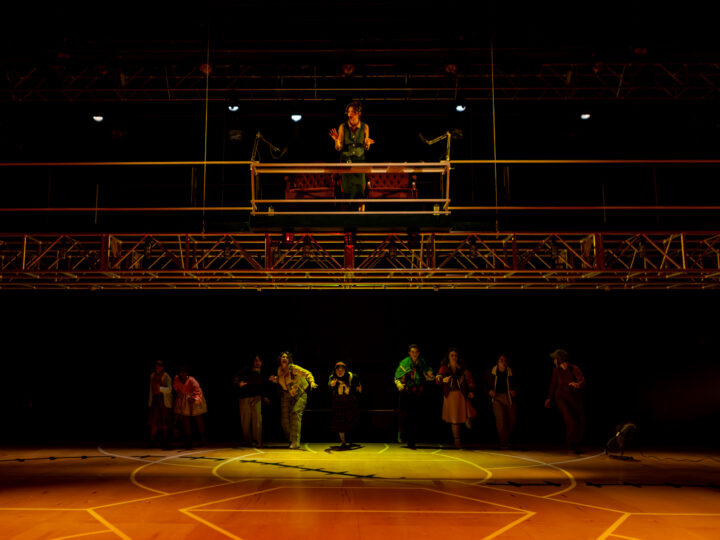 The family of Great Lakes stands at the back of the theatre running from something...something terrifying.