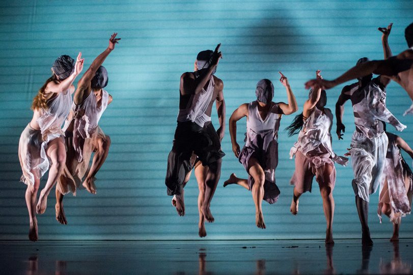 dancers running in front of green screen