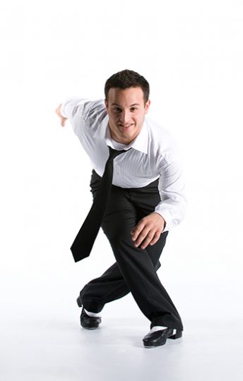 man in tap shoes and business clothes
