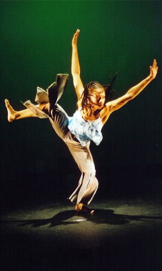 woman dancing with leg up
