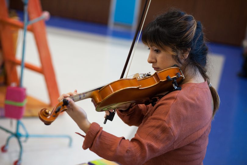 performer playing violin