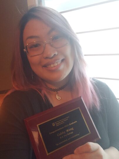 Gabby with her plaque