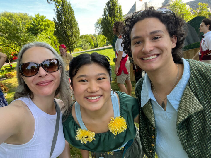 Quetta Carpenter poses with actors Mia Hsiung Nguyen and Dominic Gross after their outdoor performance