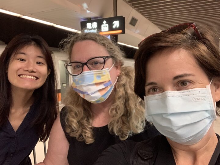 Katie Dawson, Tamara Goldbogen and I-Chia Chiu pose together in an airport