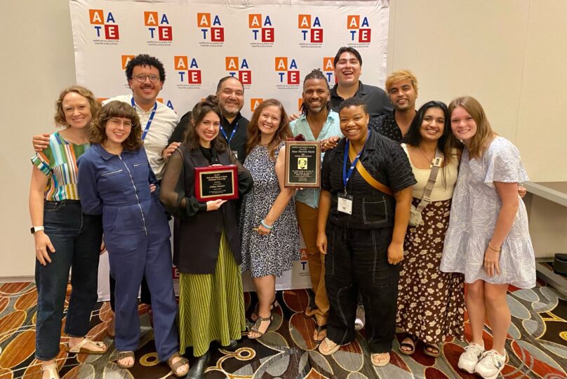 Lara Dossett posing with a group of faculty, students and alumni at the American Alliance for Theatre and Education Conference.
