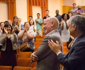 Steve Hicks with faculty and staff during the announcement of the gift