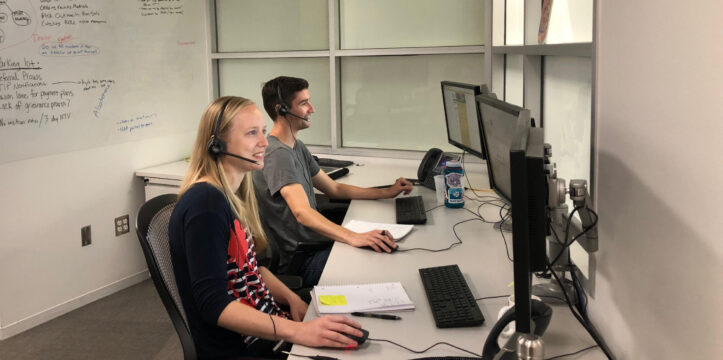 CARES intern stationed at computer