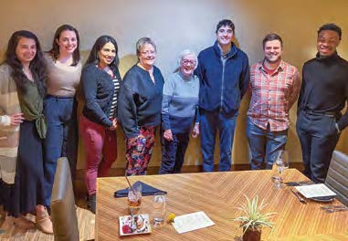 Marilyn White with a group of doctoral students.