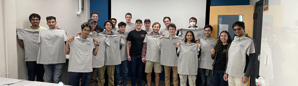 TRGS members holding up the new shirts