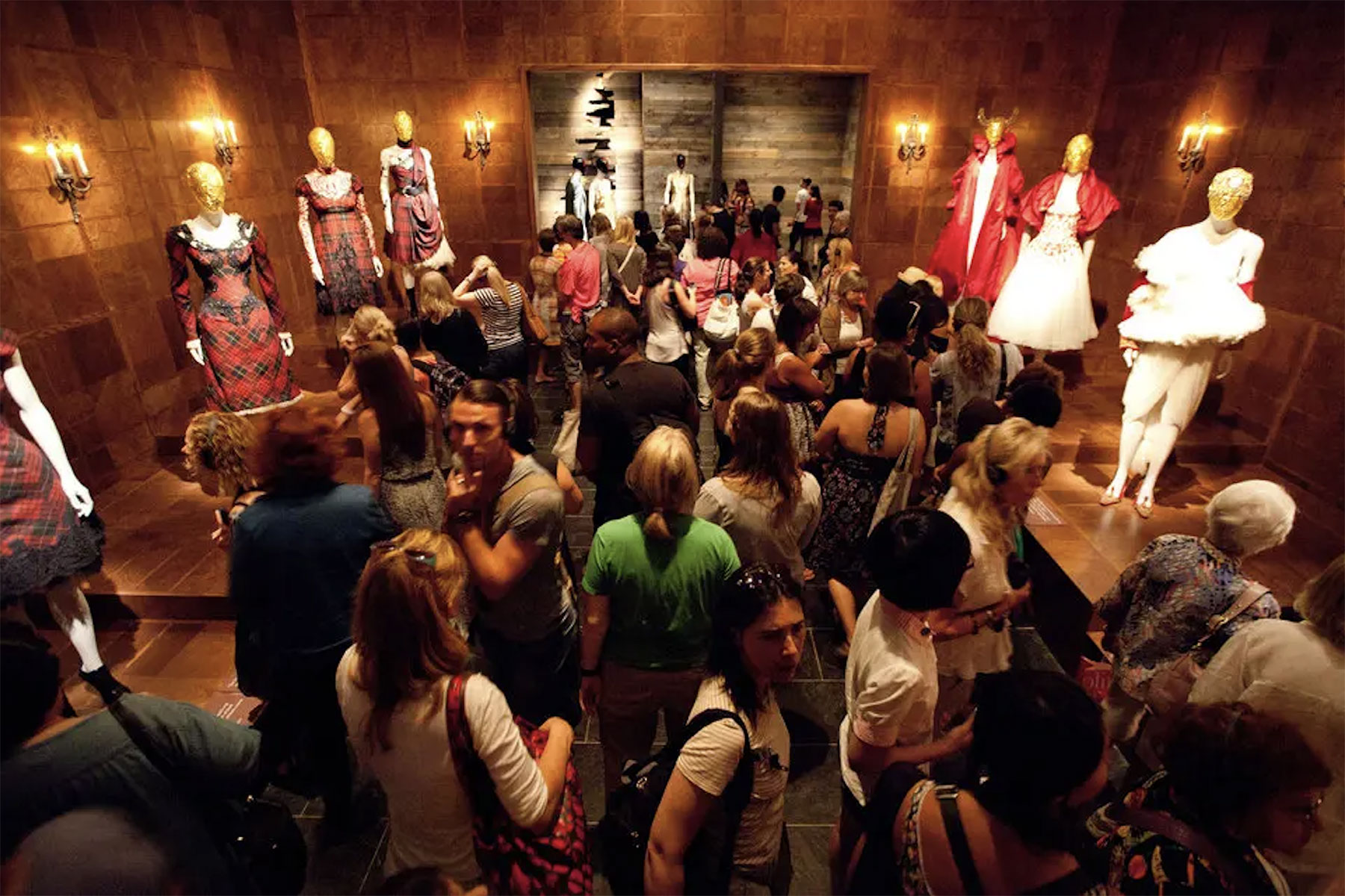 crowd of people in room at fashion show