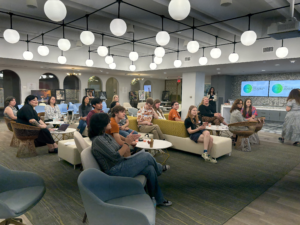 Photo of student in the Kendra Scott Center in attendance of the Future of Fine Arts Education panel.