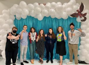 Photo of UTeach Fine Arts students and CoFA staff at the DVISD Fine Arts event