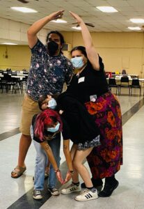 Photo of UTeach FA students demonstrating an activity at ICI
