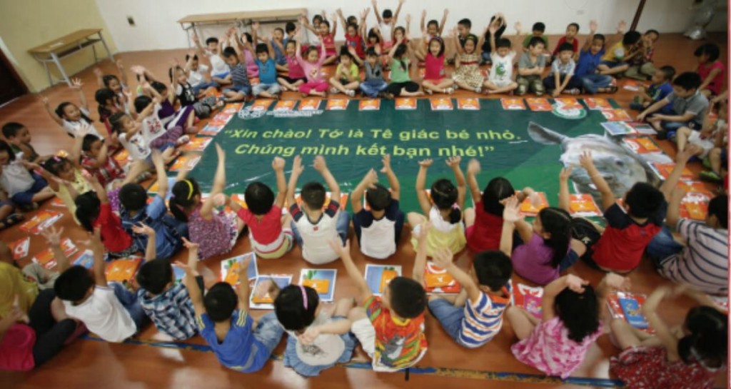 "Hello! I'm a little rhino. Let's be friends!" School-aged Vietnamese children participating in the Humane Society International and Cites campaign to reduce rhino horn demand.